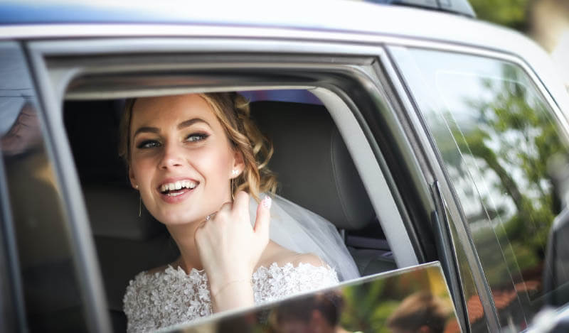 bride in wedding limo